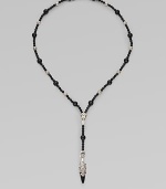 A handsomely crafted sterling silver pendant hangs from a strand of onyx beads. Sterling silver Onxy Pendant, about 1½ long Necklace, about 22 long Imported 