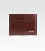 EXCLUSIVELY AT SAKS. A sophisticated option to the bulky wallet, designed in smooth leather with metal logo detail. Top-loading currency pocket Two card slots 4 X 3 Made in Italy 