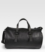 With gym-inspirations, this spacious, versatile carryall is destined to be your weekend travel essential, with exterior and interior pockets, crafted in luxurious, textured leather.Zip closureTop handlesAdjustable shoulder strapExterior, interior zip pocketsFully linedLeather20¾W x 11¾H x 11¾DImported