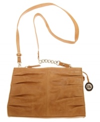 An uptown design with downtown detailing. This polished look from The Sak features a classic shoulder bag shape with pretty pleating. A chain detailed strap and signature charm add just the right amount of edge. An uptown design with downtown detailing. This polished look from The Sak features a classic shoulder bag shape with pretty pleating. A chain detailed strap and signature charm add just the right amount of edge.