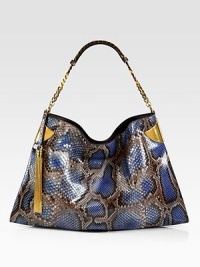 Elegantly redefined, this python shoulder bag embodies true '70's glamour. Hand colored by expert craftsmen, each version of this bag is unique.Periwinkle pythonAntique gold hardwareChain shoulder strap with leather detailMagnet snap closure on topInside zip, cell phone, and PDA pocketsNatural cotton linen liningMedium size: 17.3L x 1.4W x 11.4HMade in Italy Elegantly redefined, this python shoulder bag embodies true '70's glamour. Hand colored by expert craftsmen, each version of this bag is unique.Periwinkle pythonAntique gold hardwareChain shoulder strap with leather detailMagnet snap closure on topInside zip, cell phone, and PDA pocketsNatural cotton linen liningMedium size: 17.3L x 1.4W x 11.4HMade in Italy