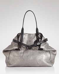 Cole Haan gives it's signature tote a metallic update. Crafted from leather and perfectly proportioned for busy days, it's a shining example of practical style. Cole Haan gives it's signature tote a metallic update. Crafted from leather and perfectly proportioned for busy days, it's a shining example of practical style.