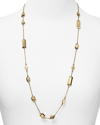 A smattering of gleaming rectangular bars dress up a simple chain on this long kate spade new york necklace, plated in gold. A smattering of gleaming rectangular bars dress up a simple chain on this long kate spade new york necklace, plated in gold.