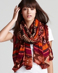 Exclusively at Bloomingdale's--warm, earthy tones add worldly style to this patterned scarf from Theodora & Callum. Exclusively at Bloomingdale's--warm, earthy tones add worldly style to this patterned scarf from Theodora & Callum.