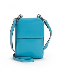 THE LOOKPhone case and wallet in oneRemovable crossbody strapSnap flap closureOne outside transparent ID slotOne outside open pocketOne inside zip pocketOne bill slotTwo inside open pocketsThree card slotsTHE MEASUREMENT3¾W X 5½H X ¾DTHE MATERIALLeatherCotton twill liningORIGINImported THE LOOKPhone case and wallet in oneRemovable crossbody strapSnap flap closureOne outside transparent ID slotOne outside open pocketOne inside zip pocketOne bill slotTwo inside open pocketsThree card slotsTHE MEASUREMENT3¾W X 5½H X ¾DTHE MATERIALLeatherCotton twill liningORIGINImported