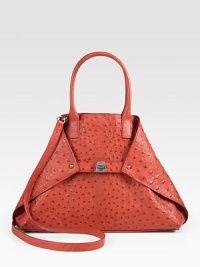 Ostrich foldover trapezoid silhouette cinched by a center turn-lock buckle closure.Double top handles, 5 dropDetachable shoulder strap, 23 dropTop snap closure and versatile turn-lock buckle closure, can be tucked into bag for a tote silhouetteProtective metal feetOne inside zip pocketTwo inside open pocketsLeather lining15¾W X 9H X 4DImported Ostrich foldover trapezoid silhouette cinched by a center turn-lock buckle closure.Double top handles, 5 dropDetachable shoulder strap, 23 dropTop snap closure and versatile turn-lock buckle closure, can be tucked into bag for a tote silhouetteProtective metal feetOne inside zip pocketTwo inside open pocketsLeather lining15¾W X 9H X 4DImported