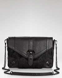 Drinks? Dinner? Dancing? Leather-trimmed with bold details, Rebecca Minkoff's rabbit fur clutch is ready to party hop. Drinks? Dinner? Dancing? Leather-trimmed with bold details, Rebecca Minkoff's rabbit fur clutch is ready to party hop.