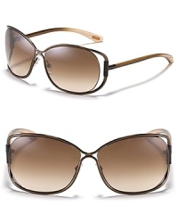 Tom Ford's oversized sunglasses with open temples add a modern element to your poolside style. Tom Ford's oversized sunglasses with open temples add a modern element to your poolside style.