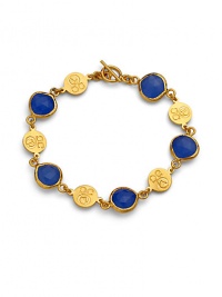 THE LOOKFive faceted 12mm deep blue chalcedony stonesGold vermeil logo-embossed disc stationsToggle closureTHE FITLength, about 7THE MATERIALBlue chalcedony22k goldplated sterling silverORIGINImported THE LOOKFive faceted 12mm deep blue chalcedony stonesGold vermeil logo-embossed disc stationsToggle closureTHE FITLength, about 7THE MATERIALBlue chalcedony22k goldplated sterling silverORIGINImported