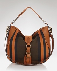 Busy days demand spacious shoulder bags, and Burberry's style is a perfect choice. With a detachable shoulder strap for versatile ease, this bag proves how fashion forward practicality can be. Busy days demand spacious shoulder bags, and Burberry's style is a perfect choice. With a detachable shoulder strap for versatile ease, this bag proves how fashion forward practicality can be.