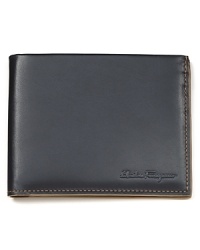 Crafted in soft, supple Italian leather, this handsome wallet makes a striking impression with cooly contrasting interior linings and plenty of room for your essentials. Crafted in soft, supple Italian leather, this handsome wallet makes a striking impression with cooly contrasting interior linings and plenty of room for your essentials.