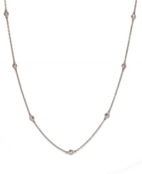 Inch by inch of luminous sparkle. B. Brilliant's delicate necklace features nine round-cut cubic zirconia stations (9/10 ct. t.w.) set in 18k gold over sterling silver. Approximate length: 24 inches. Inch by inch of luminous sparkle. B. Brilliant's delicate necklace features nine round-cut cubic zirconia stations (9/10 ct. t.w.) set in 18k gold over sterling silver. Approximate length: 24 inches.