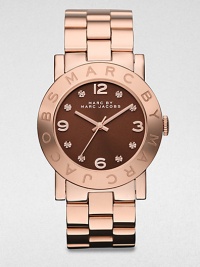 A warm rose goldtone ion-plated stainless steel timepiece with a boldly color dial and rhinestone markers. Quartz movementWater resistant to 5 ATMRound rose goldtone ion-plated stainless steel case, 36mm (1.4)Logo engraved bezelBrown dialRhinestone and numeric hour markersSecond hand Rose goldtone ion-plated stainless steel link braceletImported A warm rose goldtone ion-plated stainless steel timepiece with a boldly color dial and rhinestone markers. Quartz movementWater resistant to 5 ATMRound rose goldtone ion-plated stainless steel case, 36mm (1.4)Logo engraved bezelBrown dialRhinestone and numeric hour markersSecond hand Rose goldtone ion-plated stainless steel link braceletImported