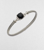 From the Petite Wheaton Collection. A beautiful cable design with a center of rich black onyx accented in dazzling diamonds. Sterling silverBlack onyxDiamonds, .08 tcwDiameter, about 2½Hook clasp closureImported 
