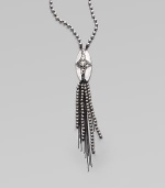 Make a statement with this chic, handcrafted design with Swarovski crystals and shell pearls. LuciteSwarvoski crystalsRutheniumMan-made shell pearlsRibbonLobster clasp closureLength, about 32Made in USA