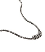 Modern design and a hint of sparkle creates a look that can be worn with anything. Fossil's effortless pendant features a rondelle center decorated with clear glass pave crystals. Crafted in silver tone mixed metal. Approximate length: 16 inches. + 2-inch extender.