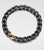 From the Hammered Chain Collection. A stunning hand-crafted, hammered design with a blend of blackened sterling silver and radiant 18k gold links. Blackened sterling silver18k goldLength, about 18.25Push clasp closureImported 