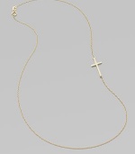 A wispy chain of 14k yellow gold features a cross pendant set askew for a modern edge.14k yellow gold Length, about 16 Pendant length, about ¾ Spring ring clasp Made in USA