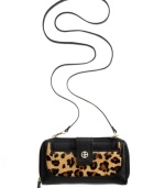 Add exotic appeal to your accessories wardrobe with this leather wallet from Giani Bernini. The exterior is outfitted in leopard print haircalf trim, golden hardware and signature accents, while the thoughtful interior features plenty of pockets and compartments for your everyday essentials.