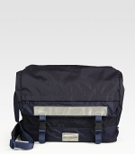 An exceptionally cool messenger is the ideal every day carryall, crafted in sturdy nylon for a sporty look.Flap, buckle closureAdjustable shoulder strapExterior,interior pocketsFully linedNylon16W x 15H x 4DImported