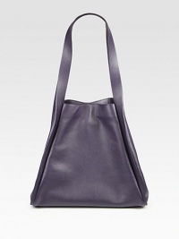 Smooth leather crafted in a roomy carryall.Shoulder straps, 10 dropMagnetic snap closure and gussetsProtective metal feetOne inside open pocket19W X 11½H X 8DImported Smooth leather crafted in a roomy carryall.Shoulder straps, 10 dropMagnetic snap closure and gussetsProtective metal feetOne inside open pocket19W X 11½H X 8DImported