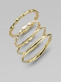 From the Glamazon Collection. A striking bangle, simply formed of twisted 18k gold with a rich hammered finish. 18k yellow gold Diameter, about 2½ Width, about ¼ Made in ItalyPlease note: Bracelets sold separately. From the Glamazon Collection. A striking bangle, simply formed of twisted 18k gold with a rich hammered finish. 18k yellow gold Diameter, about 2½ Width, about ¼ Made in ItalyPlease note: Bracelets sold separately.