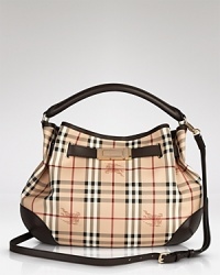 Chic and classic, Burberry's signature checked hobo is always in style. Chic and classic, Burberry's signature checked hobo is always in style.