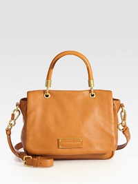 A versatile flap-top shape in rich pebbled leather. Top handle, 4¾ dropAdjustable detachable shoulder strap, 16½-21 dropMagnetic snap on flap closureOne inside zip pocketTwo inside open pocketsLogo-printed lining10W X 7H X 4DImported A versatile flap-top shape in rich pebbled leather. Top handle, 4¾ dropAdjustable detachable shoulder strap, 16½-21 dropMagnetic snap on flap closureOne inside zip pocketTwo inside open pocketsLogo-printed lining10W X 7H X 4DImported