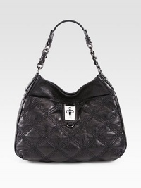 Intricate stitching defines this quilted leather design, topped with shiny metal hardware for a subtle hint of edge. Chain and leather top handle, 10 dropMagnetic snap closureOne front pocket with turn-lock closureOne inside zip pocketTwo inside open pocketsCotton lining15W X 12H X 3½DImported Intricate stitching defines this quilted leather design, topped with shiny metal hardware for a subtle hint of edge. Chain and leather top handle, 10 dropMagnetic snap closureOne front pocket with turn-lock closureOne inside zip pocketTwo inside open pocketsCotton lining15W X 12H X 3½DImported