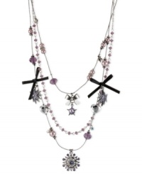 Real star power. This multi-charm illusion necklace from Betsey Johnson is crafted from hematite- and silver-tone mixed metal with black grosgrain ribbon bows providing a classic feel. Glass pearls and crystal accents add the luster. Approximate length: 16 inches + 3-inch extender. Approximate drop: 3-1/2 inches. Real star power. This multi-charm illusion necklace from Betsey Johnson is crafted from hematite- and silver-tone mixed metal with black grosgrain ribbon bows providing a classic feel. Glass pearls and crystal accents add the luster. Approximate length: 16 inches + 3-inch extender. Approximate drop: 3-1/2 inches.