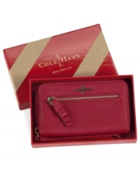 Treat your technology to standout style with this wear-with-anything wristlet from Cole Haan. Crafted from soft pebbled leather with signature accents, it's the perfect place to stash your iPhone, PDA and credit cards. Treat your technology to standout style with this wear-with-anything wristlet from Cole Haan. Crafted from soft pebbled leather with signature accents, it's the perfect place to stash your iPhone, PDA and credit cards.