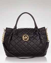 MICHAEL Michael Kors is known for jet-setting glamour, and this satchel puts its signature spin on a classic, wear-for-ever handbag, styled in quilted leather with gleaming hardware. MICHAEL Michael Kors is known for jet-setting glamour, and this satchel puts its signature spin on a classic, wear-for-ever handbag, styled in quilted leather with gleaming hardware.