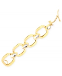 Cool and connected. Robert Lee Morris' bracelet is crafted from gold-tone mixed metal with hammered links adorned with faceted glass stones for a dazzling display. Approximate length: 7-1/2 inches. Cool and connected. Robert Lee Morris' bracelet is crafted from gold-tone mixed metal with hammered links adorned with faceted glass stones for a dazzling display. Approximate length: 7-1/2 inches.