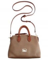 A convenient crossbody strap gives modern appeal to this classic, ladylike design from Dooney & Bourke that looks at once elegant and easygoing. Supple leather is adorned with shiny signature hardware and delicate detail stitching, while the interior offers impeccable organization. A convenient crossbody strap gives modern appeal to this classic, ladylike design from Dooney & Bourke that looks at once elegant and easygoing. Supple leather is adorned with shiny signature hardware and delicate detail stitching, while the interior offers impeccable organization.