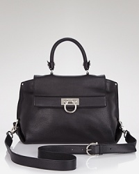 Salvatore Ferragamo's crossbody satchel in luxurious leather lends a sophisticated finish to your workday looks. Salvatore Ferragamo's crossbody satchel in luxurious leather lends a sophisticated finish to your workday looks.