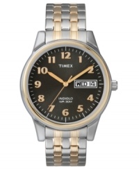 Stoic and handsome, this Timex watch features a goldtone and silvertone stainless steel expansion bracelet and round mixed case. Charcoal dial with goldtone numerals, logo and date window. Analog movement. Water resistant to 30 meters. One-year limited warranty. Stoic and handsome, this Timex watch features a goldtone and silvertone stainless steel expansion bracelet and round mixed case. Charcoal dial with goldtone numerals, logo and date window. Analog movement. Water resistant to 30 meters. One-year limited warranty.