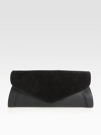 Ultra-touchable suede combines with leather in this flap-top design, imparting thoughts of refined elegance. Snap flap closureOne inside zip pocketCotton lining15W X 6¾H X 1½DImported Ultra-touchable suede combines with leather in this flap-top design, imparting thoughts of refined elegance. Snap flap closureOne inside zip pocketCotton lining15W X 6¾H X 1½DImported