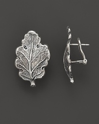 Intricately wrought sterling silver oak leaves form elegant earrings. By Buccellati. Intricately wrought sterling silver oak leaves form elegant earrings. By Buccellati.