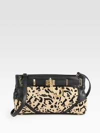 A chic style in luxurious animal printed haircalf and supple leather with a versatile detachable strap.Detachable shoulder strap, 19 dropTop zip closureProtective metal feetOne inside zip pocketTwo inside open pocketsFully lined13½W X 7H X 3DImported A chic style in luxurious animal printed haircalf and supple leather with a versatile detachable strap.Detachable shoulder strap, 19 dropTop zip closureProtective metal feetOne inside zip pocketTwo inside open pocketsFully lined13½W X 7H X 3DImported