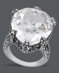 Genevieve & Grace puts the dazzle back into your look. This pretty, pear-cut cocktail ring features a clear cubic zirconia (31 ct. t.w.) surrounded by glittering marcasite accents. Set in sterling silver. Size 6, 7 and 8. Genevieve & Grace puts the dazzle back into your look. This pretty, pear-cut cocktail ring features a clear cubic zirconia (31 ct. t.w.) surrounded by glittering marcasite accents. Set in sterling silver. Size 6, 7 and 8.