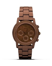 Work this season's tonal watch trend with this chocolate brown-plated style from DKNY. In an on-trend hue with glitz accents, it's a sweet statement piece. Work this season's tonal watch trend with this chocolate brown-plated style from DKNY. In an on-trend hue with glitz accents, it's a sweet statement piece.
