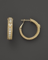 Elegant hoop earrings in 18K yellow gold accented with diamonds. From Judith Ripka. Elegant hoop earrings in 18K yellow gold accented with diamonds. From Judith Ripka.