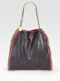 A faux leather style with faux patent details and shiny link chain trim that follows the brand's vegetarian initiatives.Double chain shoulder straps, 8½ dropMagnetic snap closureOne inside zip pocketFully lined14½W X 14H X 2½DMade in Italy A faux leather style with faux patent details and shiny link chain trim that follows the brand's vegetarian initiatives.Double chain shoulder straps, 8½ dropMagnetic snap closureOne inside zip pocketFully lined14½W X 14H X 2½DMade in Italy