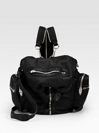 An extremely versatile design in super soft leather, adorned with exposed zippers for a hint of rock edge and a unique convertible backpack strap that unzips down the middle.Convertible backpack straps, 18 drop Shoulder strap, 15 drop Buckle drawstring snap top closure Six outside zip pockets One inside zip pocket Nickel hardware Nylon lining 15W X 13H X 3D Imported An extremely versatile design in super soft leather, adorned with exposed zippers for a hint of rock edge and a unique convertible backpack strap that unzips down the middle.Convertible backpack straps, 18 drop Shoulder strap, 15 drop Buckle drawstring snap top closure Six outside zip pockets One inside zip pocket Nickel hardware Nylon lining 15W X 13H X 3D Imported