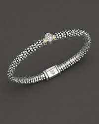 From the Twilight collection, thin caviar rope bracelet with one oval diamond pavé station and gold accents. Designed by Lagos. From the Twilight collection, thin caviar rope bracelet with one oval diamond pavé station and gold accents. Designed by Lagos.