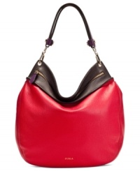 Get your groove on with this cool colorblock design from Furla that gives a nod to mod accessorizing. Sumptuous leather is accented with discrete golden hardware, featuring unexpected stud accents at the straps, while the roomy interior keeps all your must-have organized and in place. Get your groove on with this cool colorblock design from Furla that gives a nod to mod accessorizing. Sumptuous leather is accented with discrete golden hardware, featuring unexpected stud accents at the straps, while the roomy interior keeps all your must-have organized and in place.