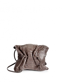 THE LOOKCrossbody strapCinched flapMagnetic tab closure under flapDrawstring topInside logo detailTHE MEASUREMENTCrossbody strap, 32 drop5W X 4H X 2½DTHE MATERIALPythonLeather and printed fabric liningORIGINMade in USA THE LOOKCrossbody strapCinched flapMagnetic tab closure under flapDrawstring topInside logo detailTHE MEASUREMENTCrossbody strap, 32 drop5W X 4H X 2½DTHE MATERIALPythonLeather and printed fabric liningORIGINMade in USA
