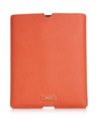 Treat your technology to an instant upgrade with this sleek iPad sleeve from DKNY. Crafted from soft Saffiano leather with signature detailing, it's sized right to slip inside your purse, but looks perfectly posh outside your it-bag. Treat your technology to an instant upgrade with this sleek iPad sleeve from DKNY. Crafted from soft Saffiano leather with signature detailing, it's sized right to slip inside your purse, but looks perfectly posh outside your it-bag.