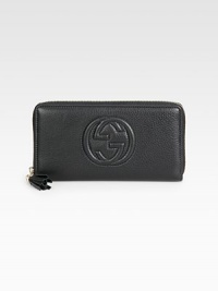 Rich pebble-grain leather embossed with interlocking G in a classic continental silhouette.Zip-around closureCenter zip pocketThree inner pocketsTwelve credit card slotsFully lining7¼W X 3¾H X 1DMade in Italy Rich pebble-grain leather embossed with interlocking G in a classic continental silhouette.Zip-around closureCenter zip pocketThree inner pocketsTwelve credit card slotsFully lining7¼W X 3¾H X 1DMade in Italy