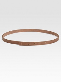 This slim leather style is finished with a subtle signature punto dot.Peg buckleStitched end detailAbout ½ wideLeatherMade in Switzerland of Italian fabric This slim leather style is finished with a subtle signature punto dot.Peg buckleStitched end detailAbout ½ wideLeatherMade in Switzerland of Italian fabric